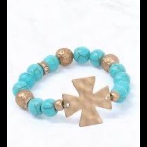 Beautiful Classy Turquoise and Gold Beaded Bracelet. The cross is stunning